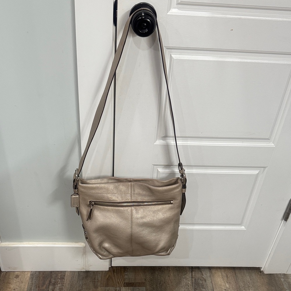 Coach Hobo Duffle Pebbled Leather Pewter
Metallic Crossbody Shoulder Bag
